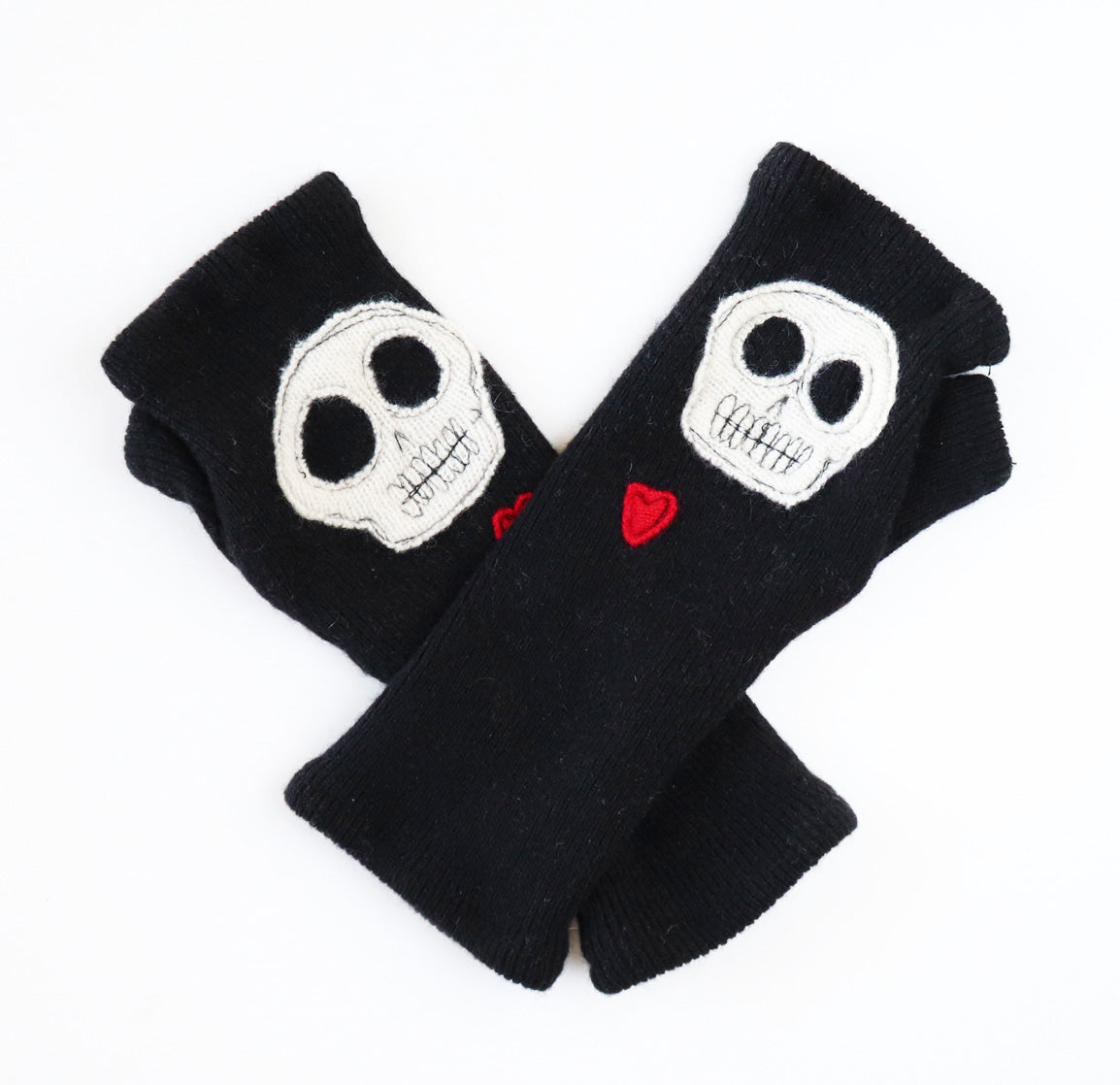 Pink cashmere gloves with stitched daisy